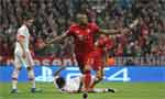 Football: Vidal gives Bayern slender lead against Benfica