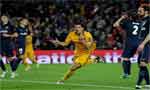 Football: Suarez double salvages Barca against 10-man Atletico