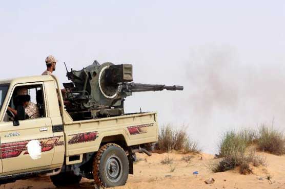 Isis beheads 12 officers in vengeful town occupation