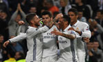 Real Madrid reach 16 as toppers after beating Sporting