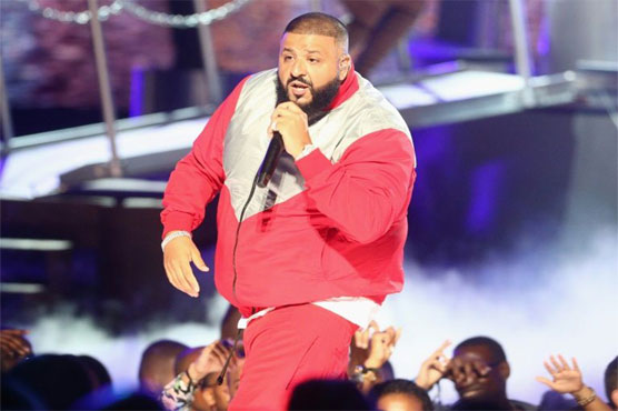 DJ Khaled, once in background, scores another No. 1 album