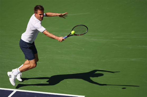 Seeded John Isner reaches Hall of Fame semifinals