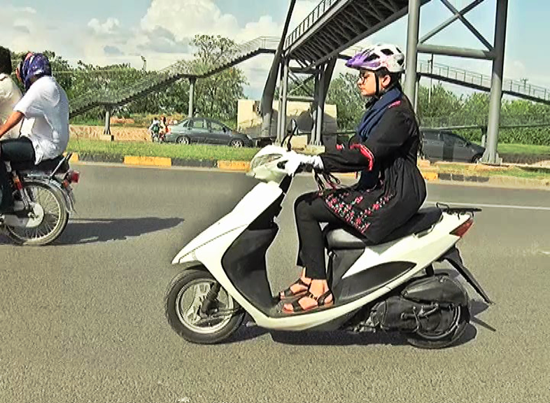 girl in scooty