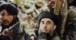 Karzai in move to share power with warlord wanted by US