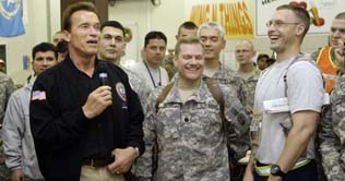 Schwarzenegger drops in on US troops in Iraq