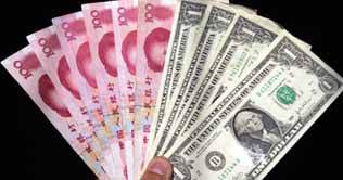 Dollar falls to lowest level against yen in 14 years