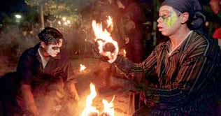 Young men hurl fireballs in El Salvador festival 