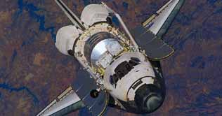 Discovery shuttle landing delayed by thunderstorms 