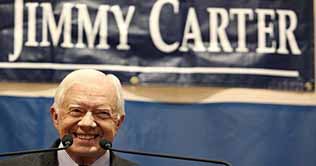 Carter says US might have plotted against Chavez 