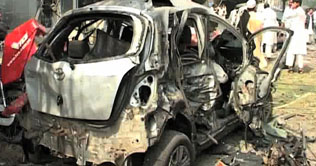 Suicide car blast in Peshawar kills 11, injures 58