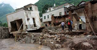 China mudslide death toll rises to 702