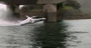 Shark-like boat runs underwater and jumps 12-feet in air