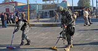 Iraq: Twin blasts kill 17