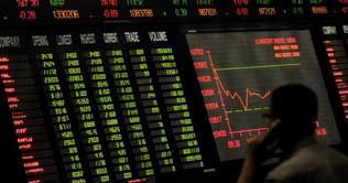 KSE ends higher on first business day
