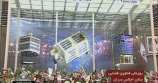 Iran test fires long range rocket