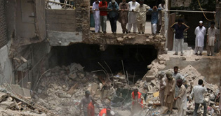 Building collapses in Bolton market during rescue work