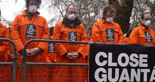 Protesters decry eighth anniversary of Guantanamo Bay