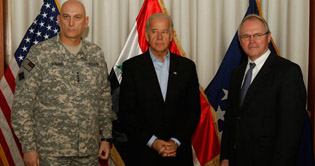 Biden visits Iraq amid row over elections