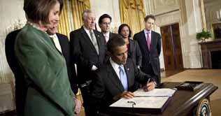 Obama signs Iran sanctions into law 