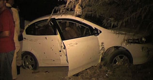 Karachi: Security officials recover the hostage during an operation