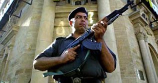 Karachi: 4 robbers storm into 3 houses