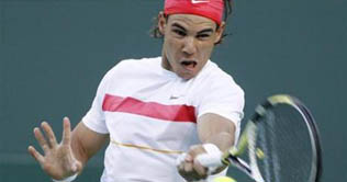 Nadal reaches quarter-finals in style