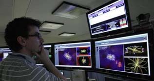 Atom smasher achieves record power