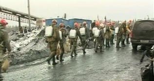 Russian mine blast kills 8, traps over 50