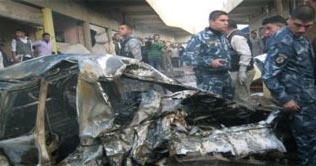 Mini-van bomb kills 23 in central Iraq