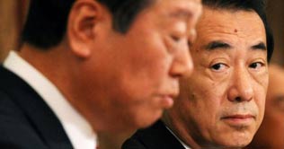  Japan PM Naoto Kan survives leadership challenge