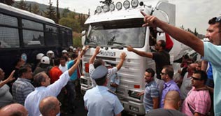 Greek truckers protest government vote