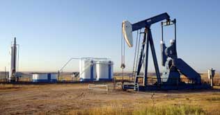 Crude oil prices down as dollar rises