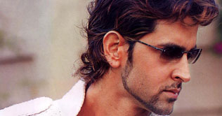 Hrithik smacks his hand on coconut to get it hurt