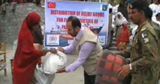 Gilgit: Relief goods distributed among flood victims