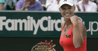 Caroline firms no 1 ranking with victory at Family Circle  