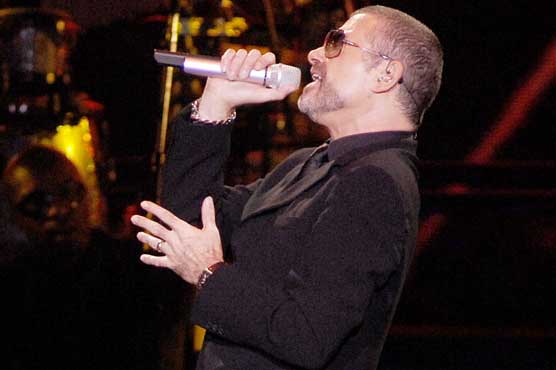 Hospitalized George Michael improving