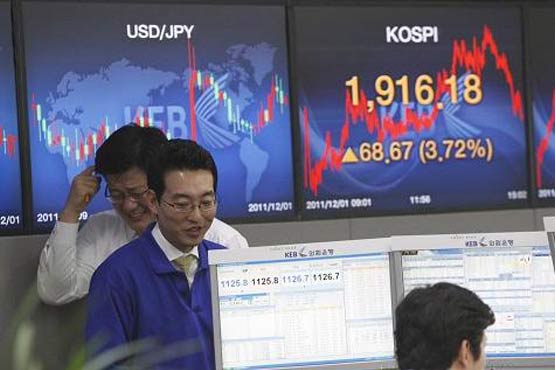 Asia stocks mixed before Merkel speech, jobs data