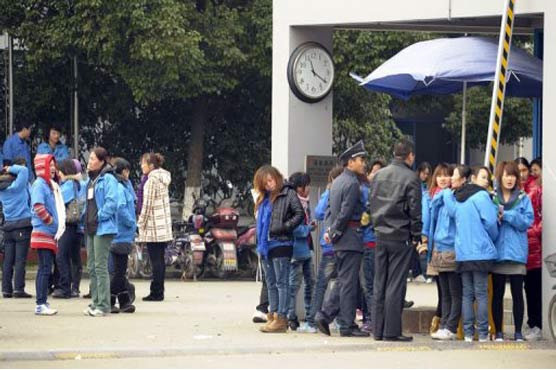 Workers clash with police in Shanghai