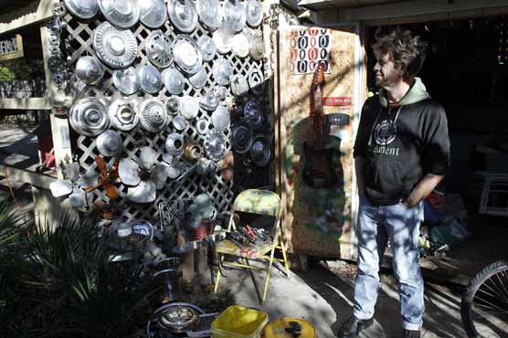 Professor is dumpster-diving urban Robin Hood