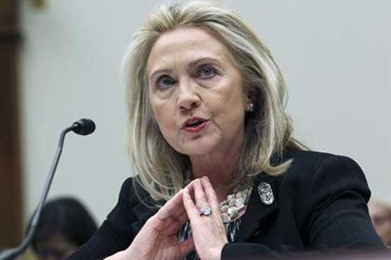 Clinton at Afghan talks as aides play down Pakistan boycott