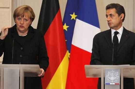 Merkel, Sarkozy demand tough new eurozone pact 