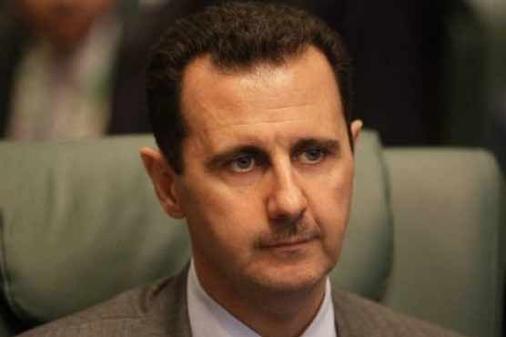 White House rejects Assad's violence denial