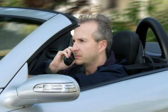 Safety board proposes ban on cell use while driving