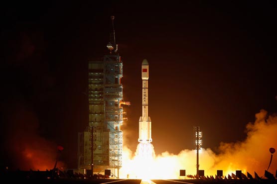 China celebrates space docking success