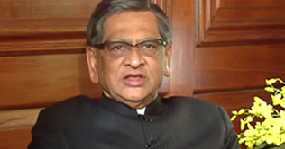 Radio-tracking devices fixed on Indian students ankles