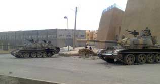 Syrian government calls back tanks 