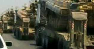 Syria pulls outs tanks from Hama