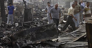 35 killed in twin blasts in Iraq