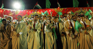 Mass wedding in Gaddafi's compound