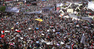 Revolution continues, Egyptians tell military junta